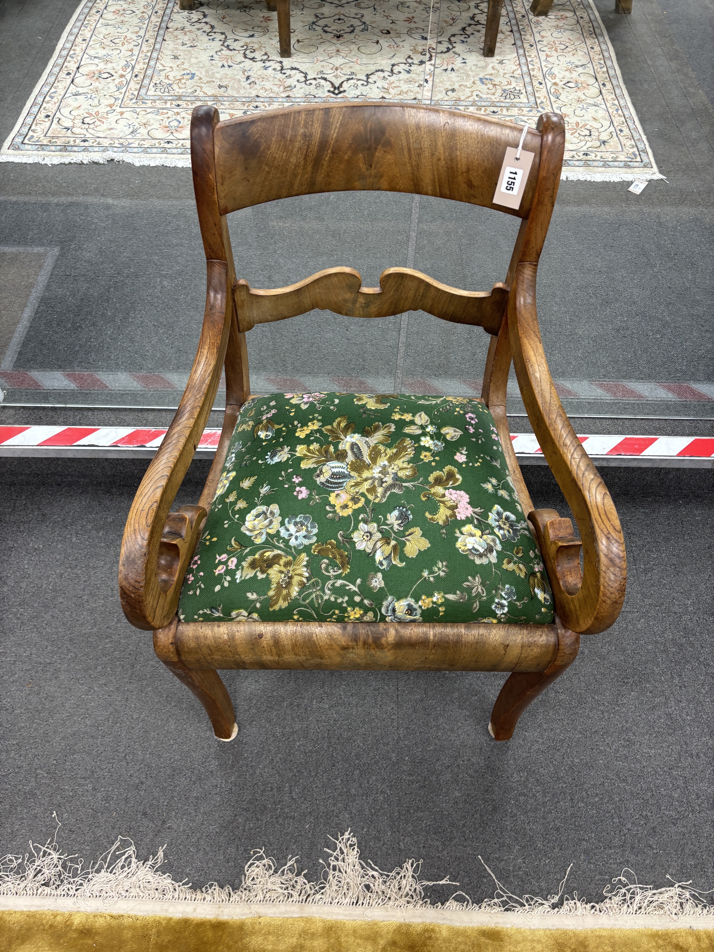 A 19th century Dutch elm and mahogany elbow chair, width 57cm, depth 50cm, height 88cm